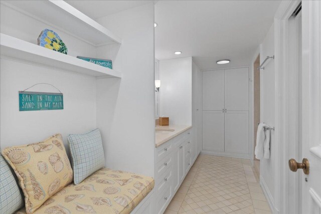 1300 Hackberry Ln, Winnetka, IL 60093 - bathroom featuring tile patterned floors, vanity, and recessed lighting