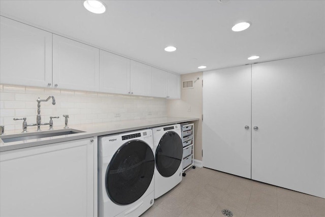 1300 Hackberry Ln, Winnetka, IL 60093 - laundry room featuring independent washer and dryer, cabinet space, and recessed lighting