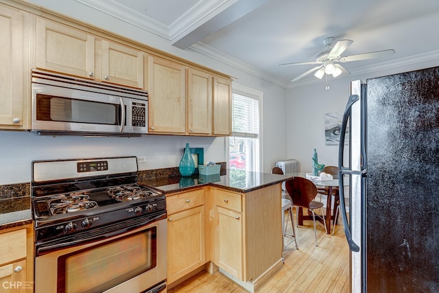 1949 W Argyle St Unit 1, Chicago, IL 60640 - kitchen with appliances with stainless steel finishes, light brown cabinets, light wood finished floors, ornamental molding, and ceiling fan