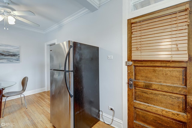 1949 W Argyle St Unit 1, Chicago, IL 60640 - kitchen featuring freestanding refrigerator, ceiling fan, ornamental molding, and light wood-style flooring