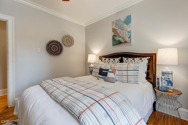 1949 W Argyle St Unit 1, Chicago, IL 60640 - bedroom featuring ornamental molding and wood finished floors