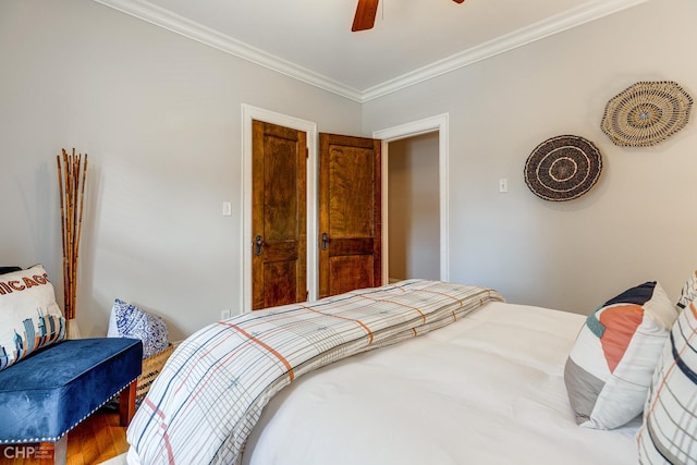 1949 W Argyle St Unit 1, Chicago, IL 60640 - bedroom with crown molding, ceiling fan, and wood finished floors