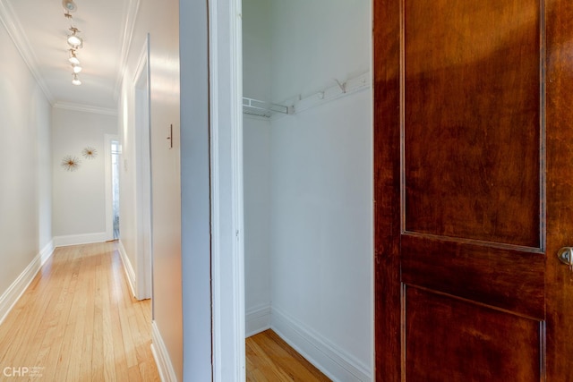 1949 W Argyle St Unit 1, Chicago, IL 60640 - corridor with light wood-type flooring, crown molding, and track lighting