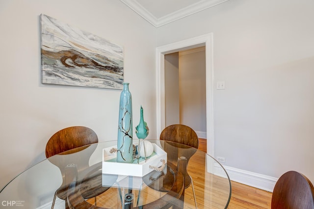 1949 W Argyle St Unit 1, Chicago, IL 60640 - dining room with wood finished floors and crown molding