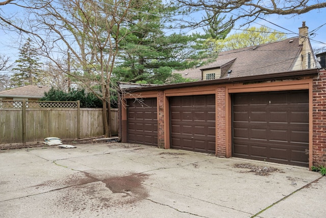 garage with fence