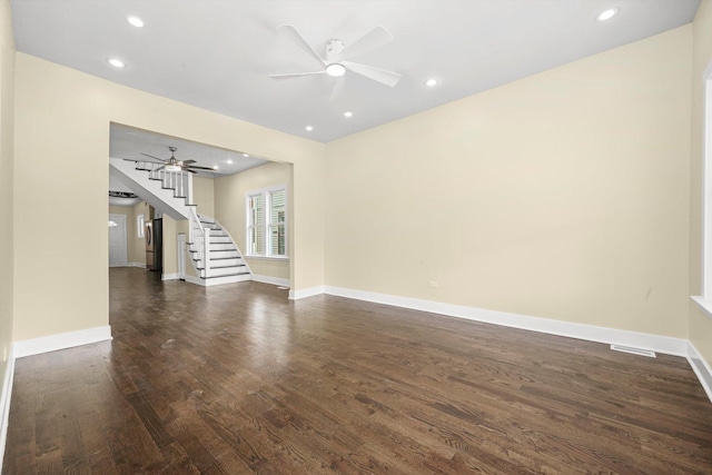 10617 S Wentworth Ave, Chicago, IL 60628 - unfurnished room featuring dark wood-type flooring, a ceiling fan, stairs, and recessed lighting