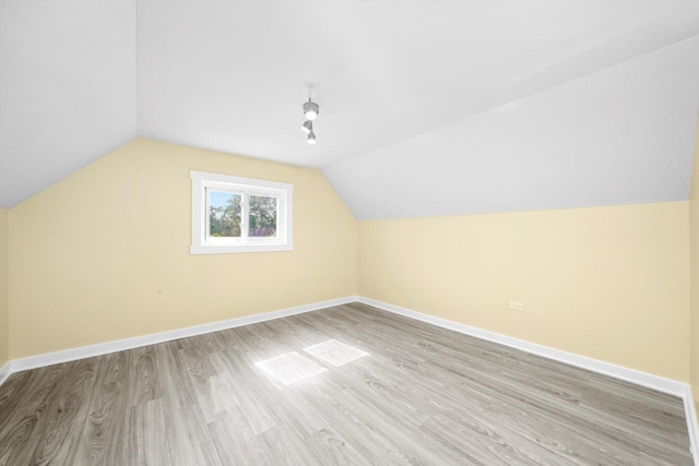 10617 S Wentworth Ave, Chicago, IL 60628 - additional living space featuring light wood-style flooring and lofted ceiling