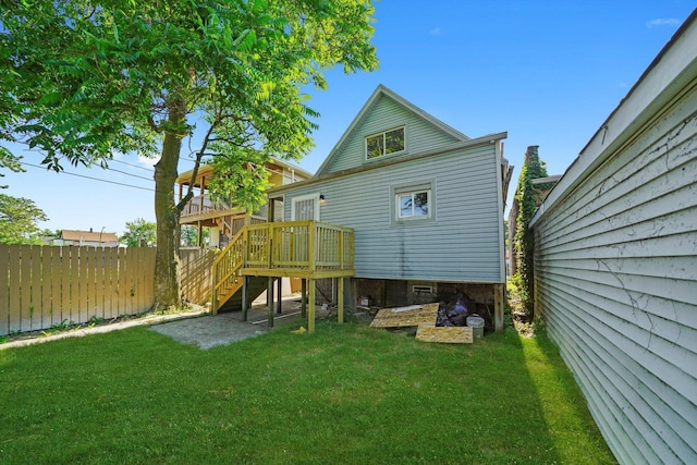 10617 S Wentworth Ave, Chicago, IL 60628 - back of house with stairway and a wooden deck