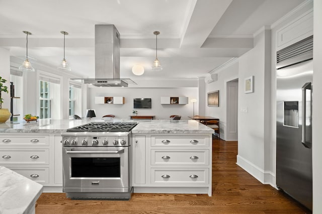 kitchen with high quality appliances, island exhaust hood, crown molding, white cabinets, and open floor plan