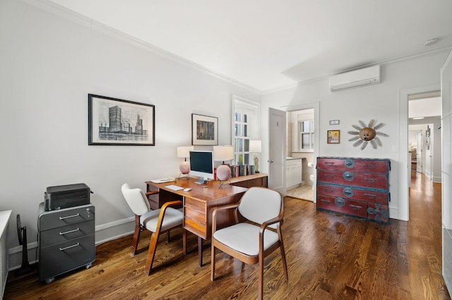 office space featuring ornamental molding, a wall unit AC, and wood finished floors