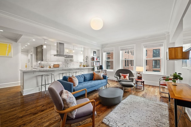 living area with crown molding, baseboards, recessed lighting, and dark wood-style floors