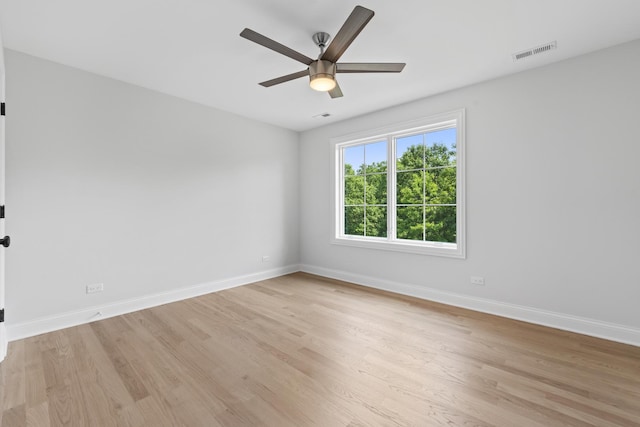 7213 Daybreak Ln, Long Grove, IL 60060 - spare room featuring light wood-style flooring, ceiling fan, and baseboards