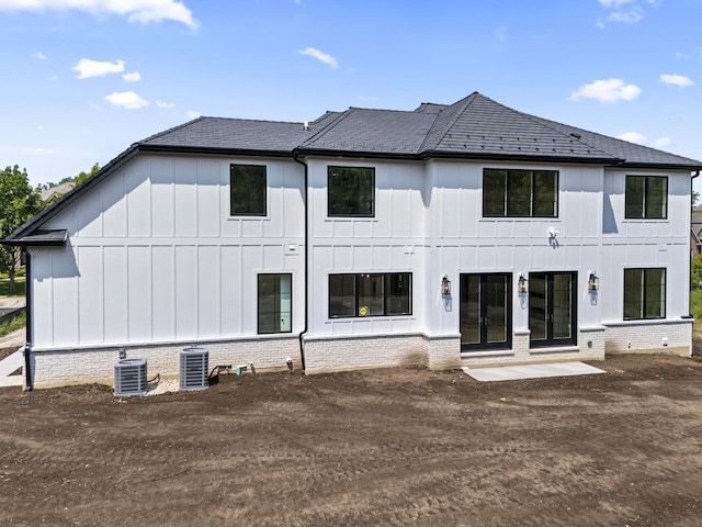 7213 Daybreak Ln, Long Grove, IL 60060 - back of house with french doors, board and batten siding, central air condition unit, and crawl space