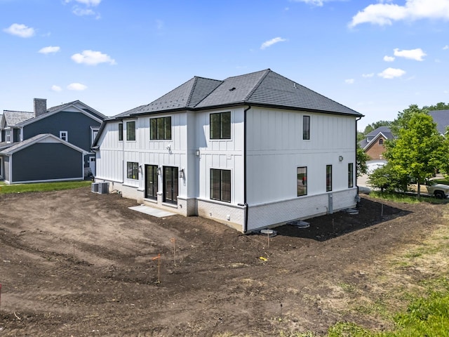 7213 Daybreak Ln, Long Grove, IL 60060 - back of property with board and batten siding, central AC, and brick siding