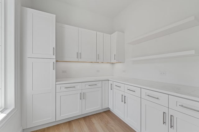 7213 Daybreak Ln, Long Grove, IL 60060 - kitchen featuring open shelves, white cabinetry, and light wood finished floors