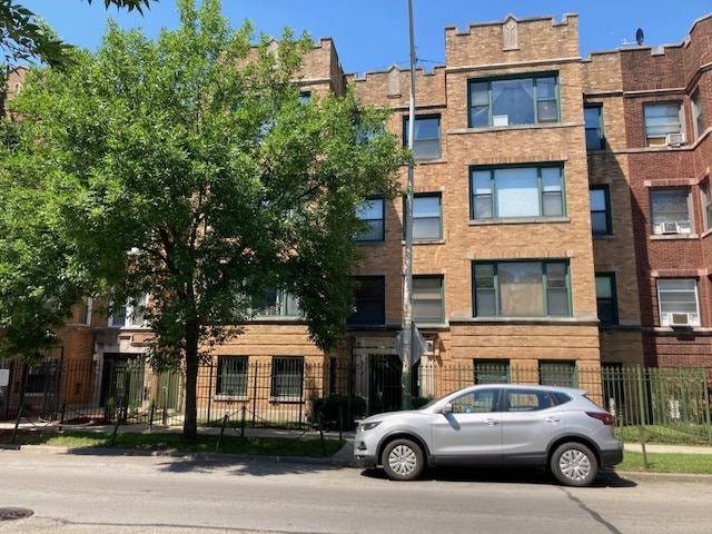 7308 S Yates Blvd Unit 1, Chicago, IL 60649 - view of property featuring fence