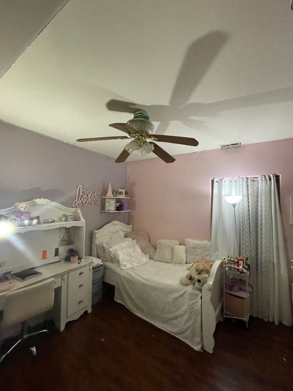 7308 S Yates Blvd Unit 1, Chicago, IL 60649 - bedroom with a ceiling fan and wood finished floors