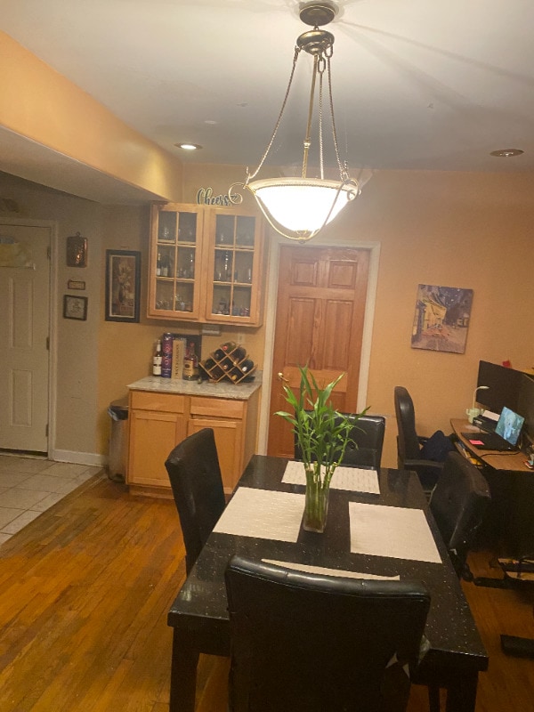 7308 S Yates Blvd Unit 1, Chicago, IL 60649 - dining space featuring light wood-style floors