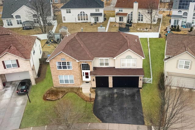 birds eye view of property with a residential view