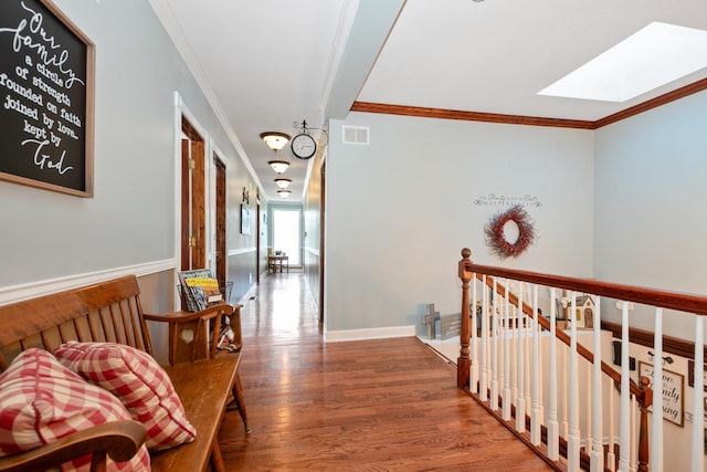 9201 175th St, Tinley Park, IL 60487 - hall featuring a skylight, crown molding, wood finished floors, and an upstairs landing