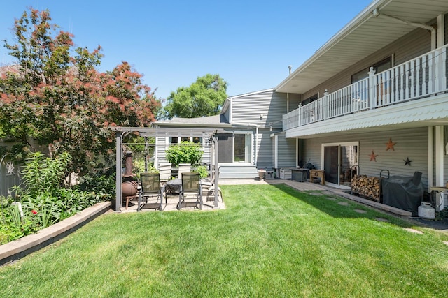 9201 175th St, Tinley Park, IL 60487 - view of grassy yard featuring a balcony, a patio area, and entry steps