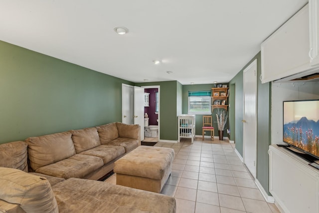 living room with light tile patterned flooring, baseboards, and recessed lighting