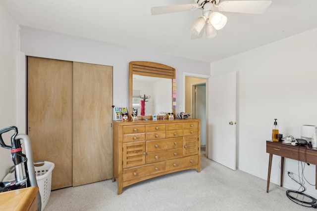 bedroom with a closet and ceiling fan
