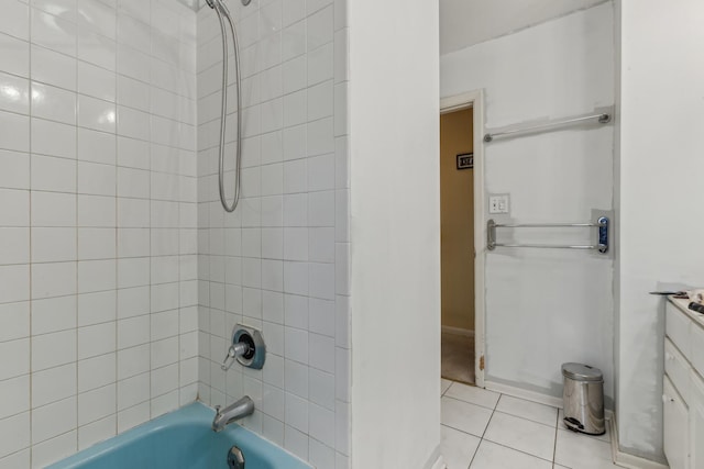 full bath featuring tile patterned flooring and bathtub / shower combination