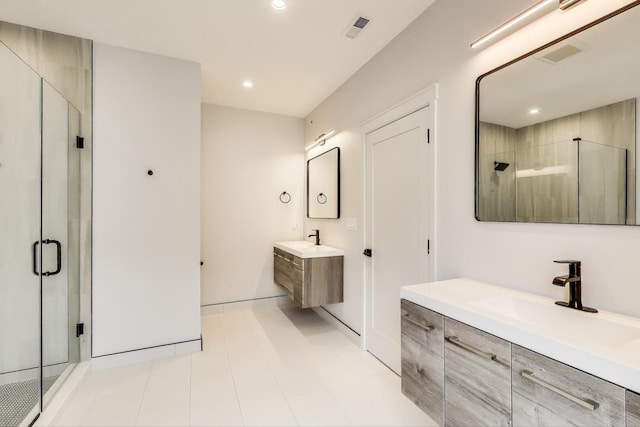 7302 Ponto Ct, Morton Grove, IL 60053 - full bath featuring a shower stall, two vanities, and recessed lighting