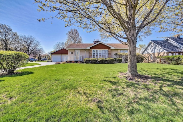 ranch-style house with a front lawn, driveway, a garage, and a chimney