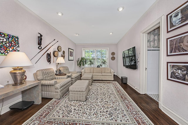 living room featuring baseboards and dark wood-style flooring