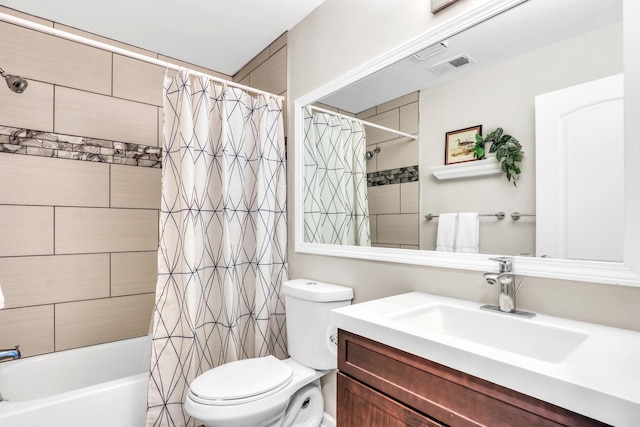 104 E Winchester Rd Unit E, Libertyville, IL 60048 - bathroom with toilet, shower / bath combo with shower curtain, and vanity