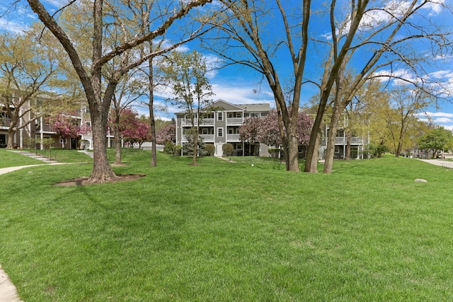 104 E Winchester Rd Unit E, Libertyville, IL 60048 - surrounding community with a lawn