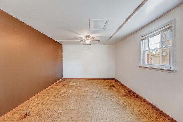 spare room featuring baseboards