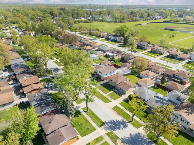 aerial overview of property's location with nearby suburban area
