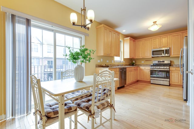 1123 E Port Clinton Rd, Vernon Hills, IL 60061 - kitchen with appliances with stainless steel finishes, light brown cabinetry, light stone counters, a sink, and recessed lighting