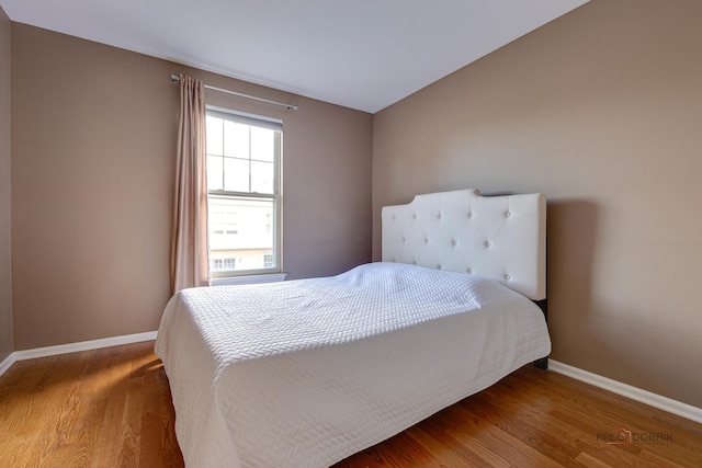1123 E Port Clinton Rd, Vernon Hills, IL 60061 - bedroom with baseboards and wood finished floors