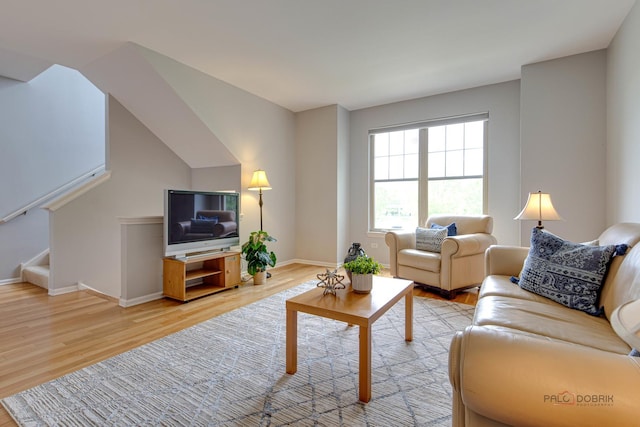 1123 E Port Clinton Rd, Vernon Hills, IL 60061 - living room with wood finished floors, baseboards, and stairway