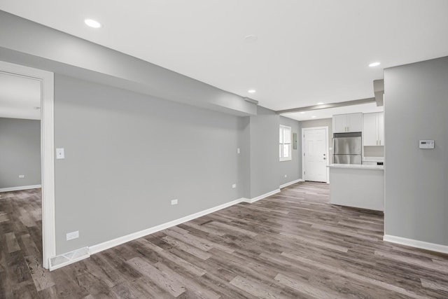 16460 Wood St, Markham, IL 60428 - unfurnished living room featuring recessed lighting, dark wood finished floors, and baseboards