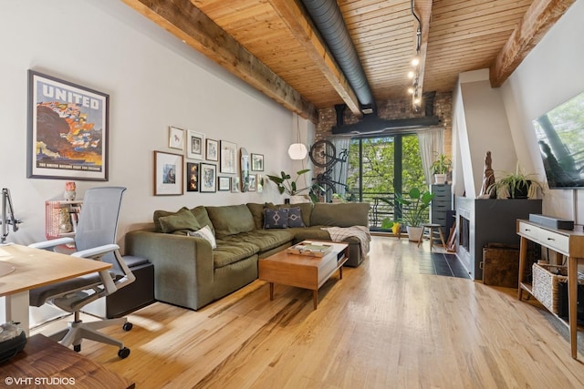 living room featuring beamed ceiling, wooden ceiling, and wood finished floors