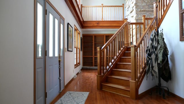 2346 W Longhollow Rd, Elizabeth, IL 61028 - foyer entrance featuring wood finished floors, baseboards, and stairway