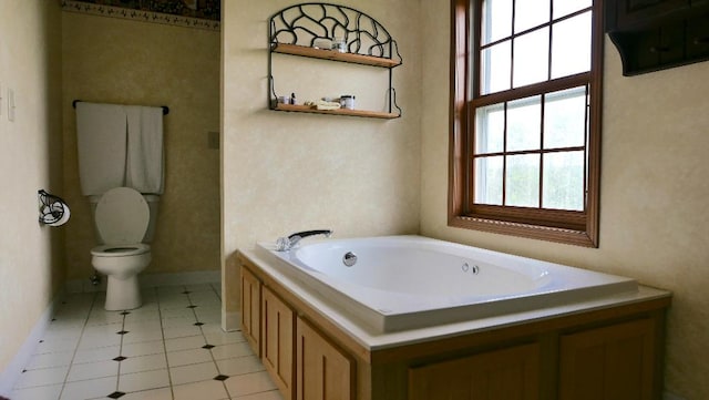 2346 W Longhollow Rd, Elizabeth, IL 61028 - full bathroom with a bath, toilet, and baseboards