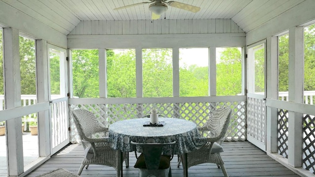 2346 W Longhollow Rd, Elizabeth, IL 61028 - sunroom featuring lofted ceiling, ceiling fan, healthy amount of natural light, and outdoor dining area