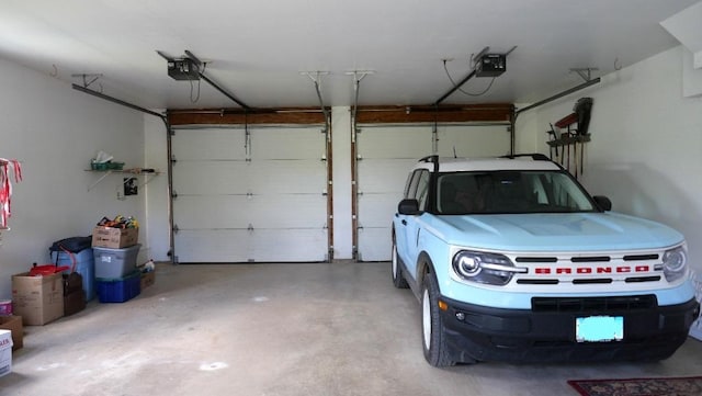 2346 W Longhollow Rd, Elizabeth, IL 61028 - garage featuring a garage door opener