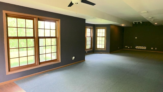 2346 W Longhollow Rd, Elizabeth, IL 61028 - carpeted empty room featuring baseboards and a ceiling fan
