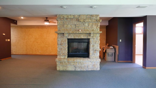 2346 W Longhollow Rd, Elizabeth, IL 61028 - unfurnished living room with carpet flooring, a ceiling fan, baseboards, and a fireplace