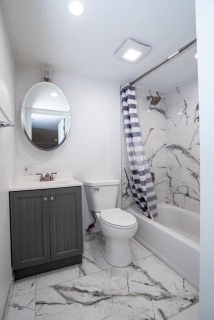 bathroom featuring toilet, shower / tub combo, marble finish floor, and vanity