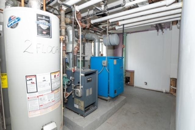 utilities featuring a heating unit and gas water heater