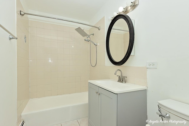 full bath featuring backsplash, toilet, shower / washtub combination, and vanity