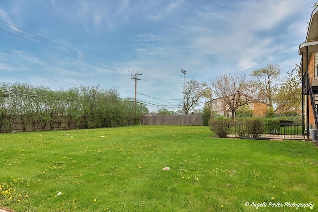 view of yard featuring fence